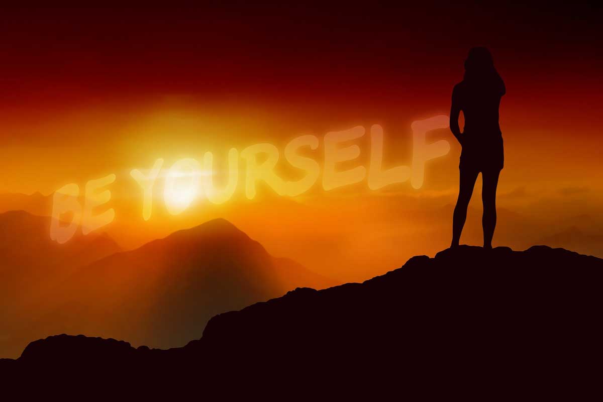 sunset photo says be yourself in the clouds.