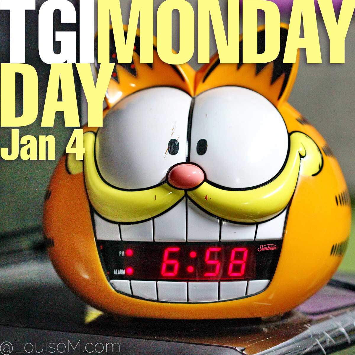 tgi monday day text on garfield alarm clock.